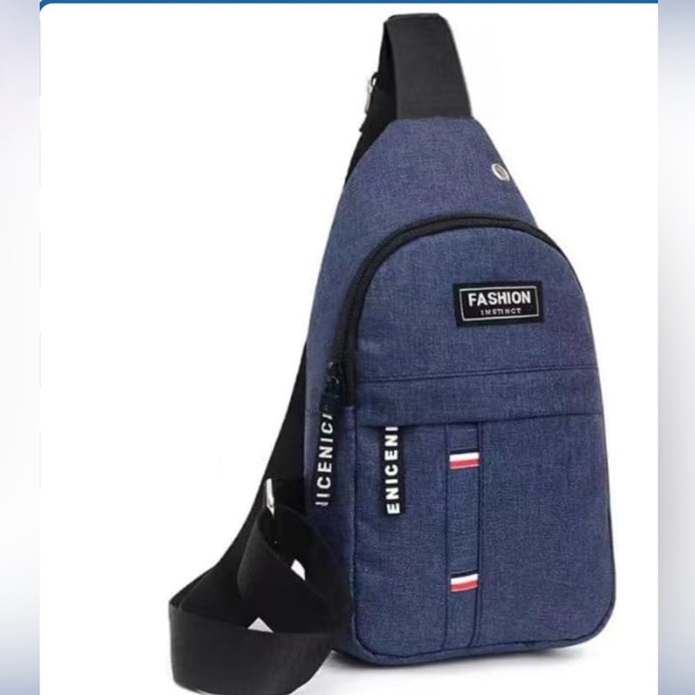 Fashion Instinct Blue Crossbody Sling Bag/Backpack. Aprox. 12x 6.5 x 3.5” NWT